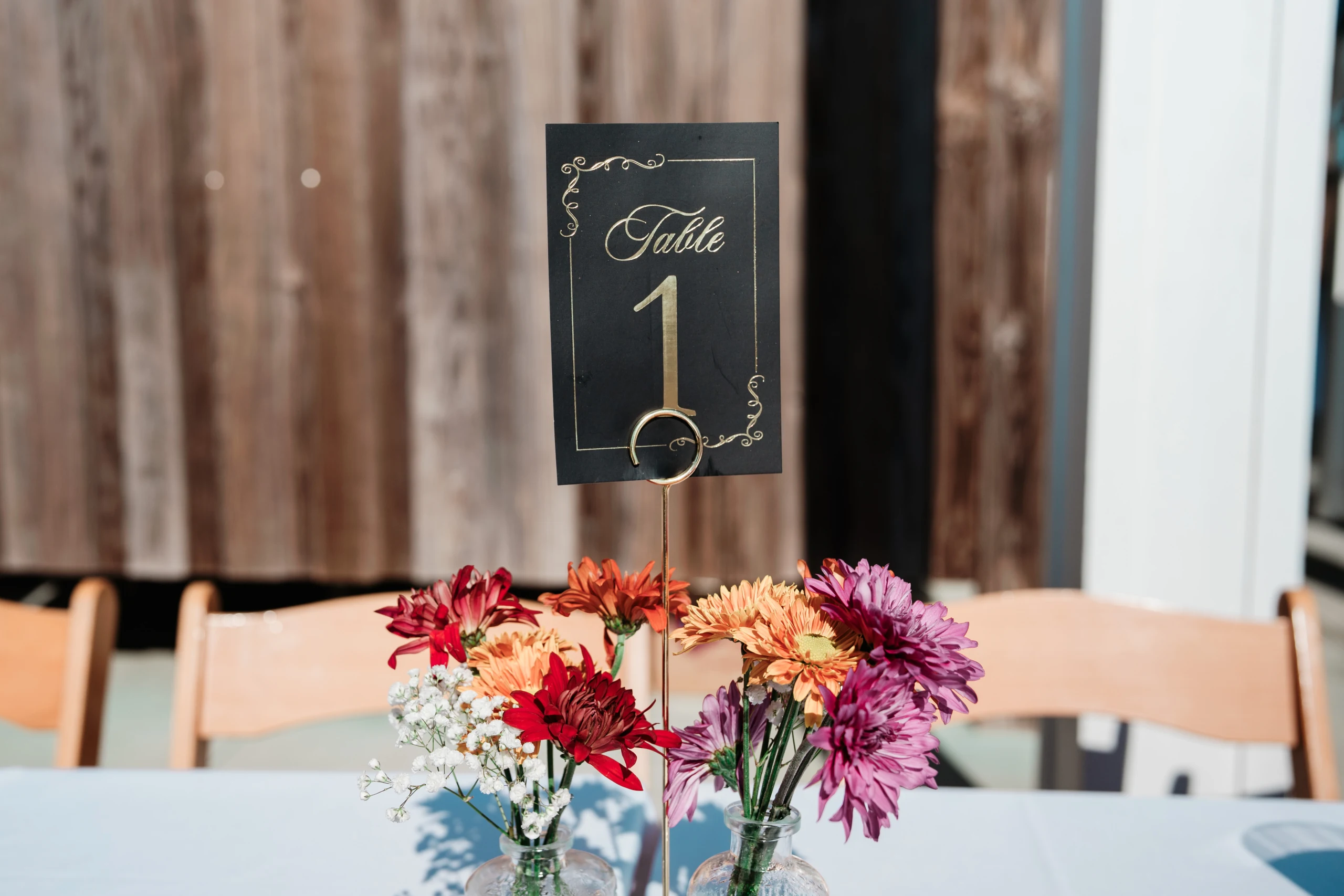 Elegant bridal portrait featuring a beautiful bouquet of peach and white flowers.
