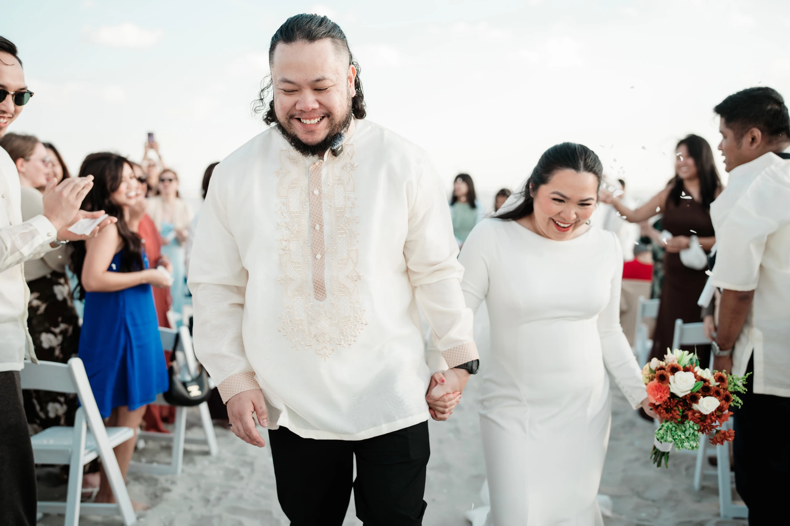 Best Places to Get Engaged engagement photos in wilmington nc | pink penguin studios groom smiles while fiance kisses him