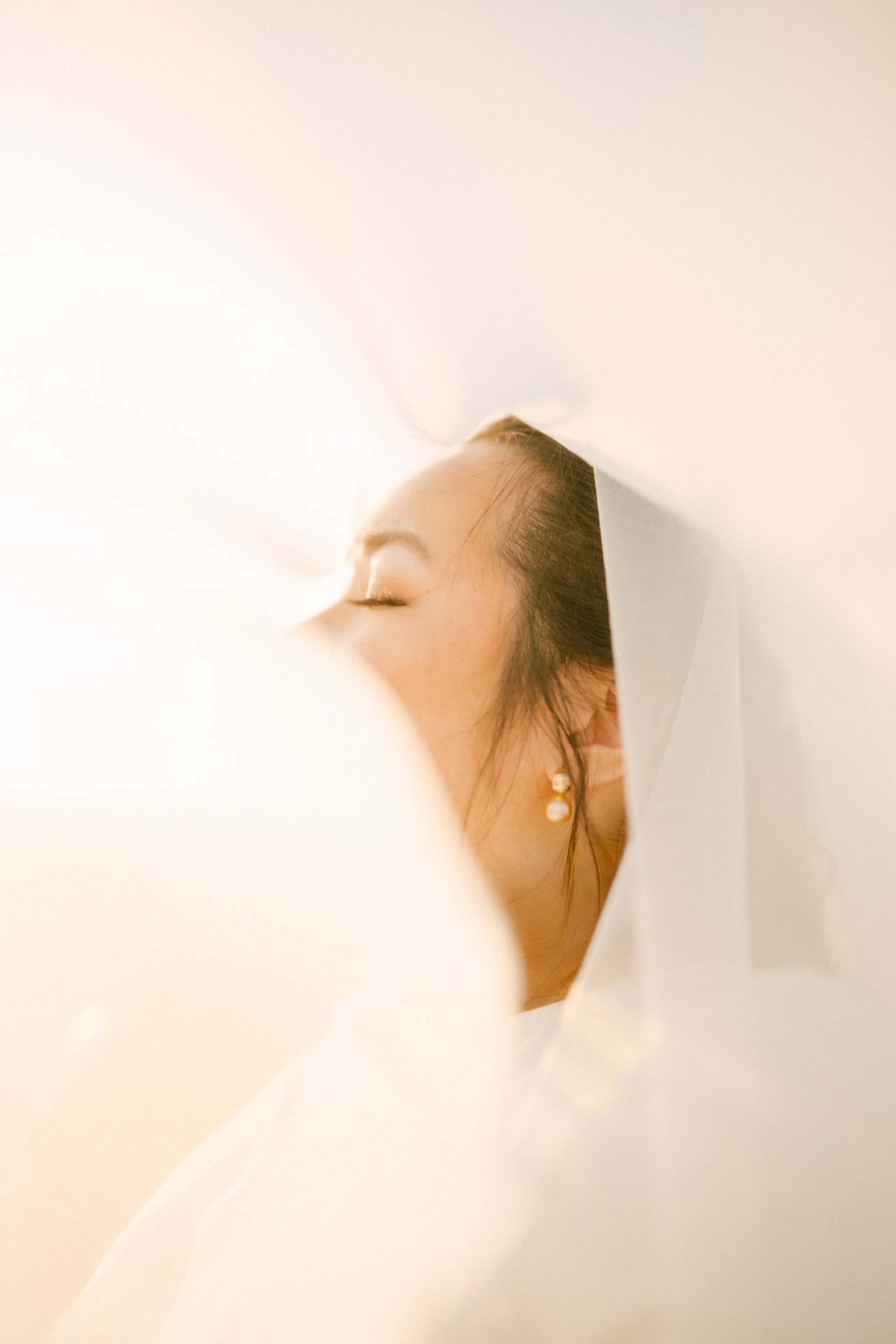 couples pose in front of a vintage car and city of wilmington