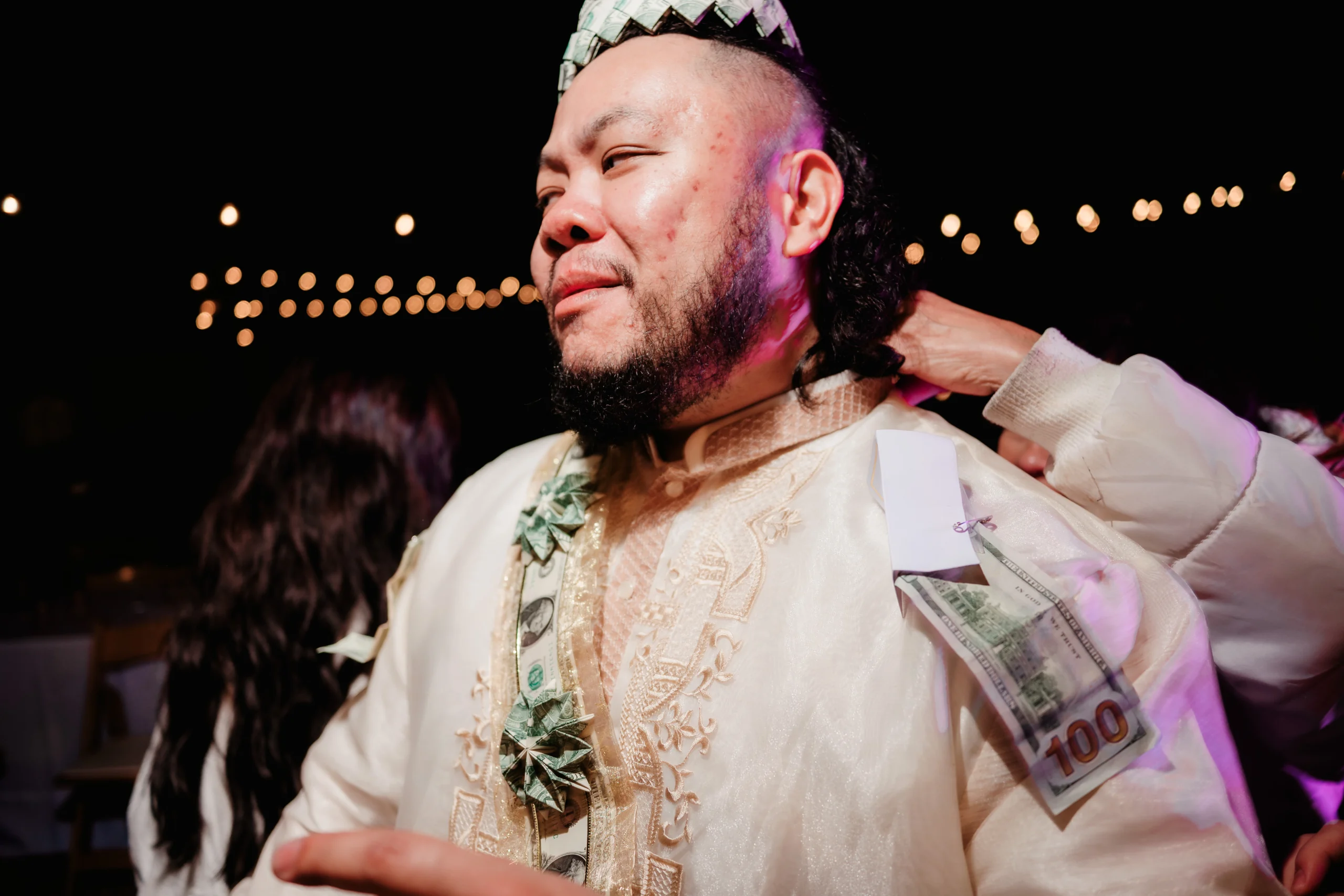 A joyful couple sharing an intimate moment while swimming in ocean waters.