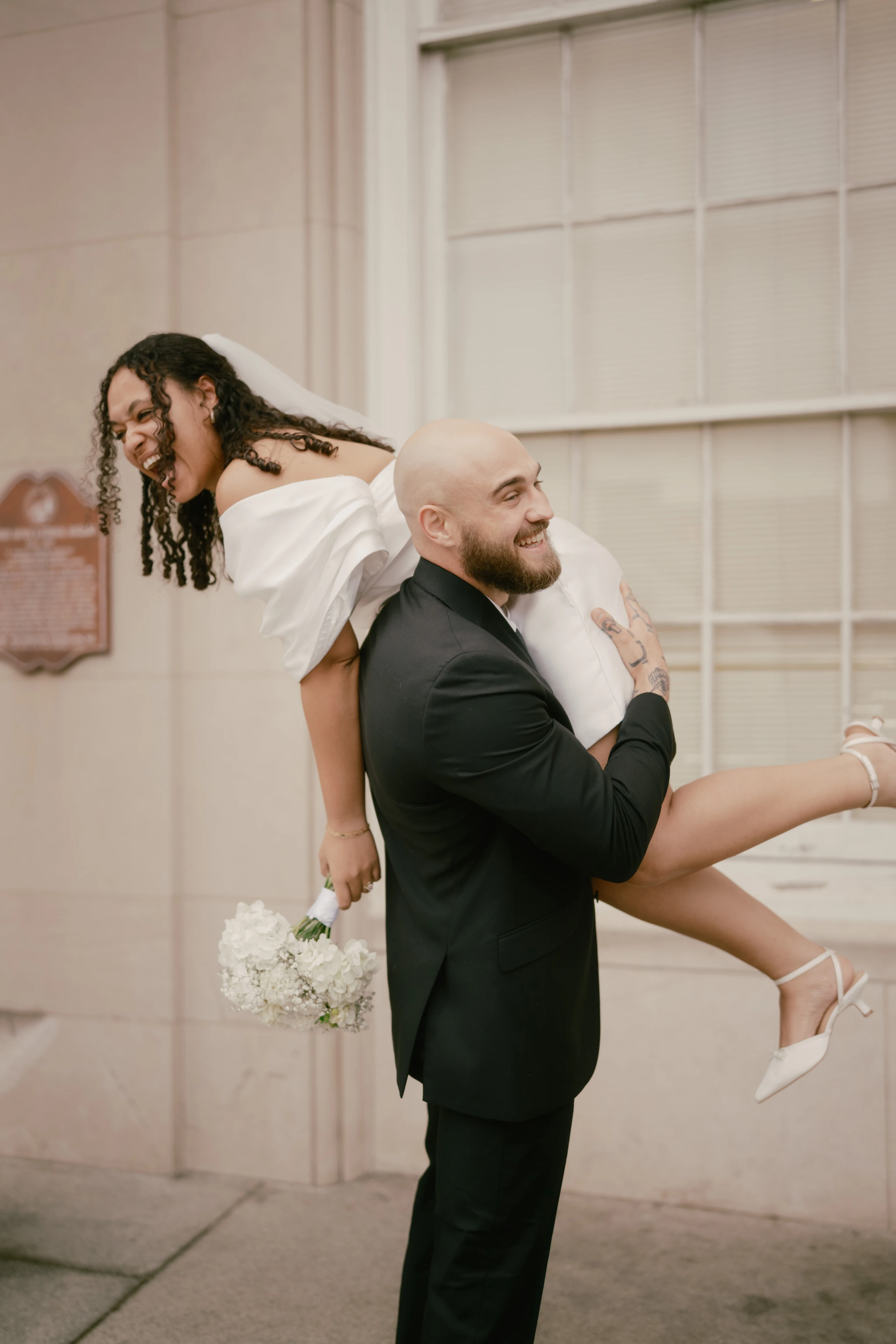 Wedding couple outside St. James Episcopal Church in downtown Wilmington.